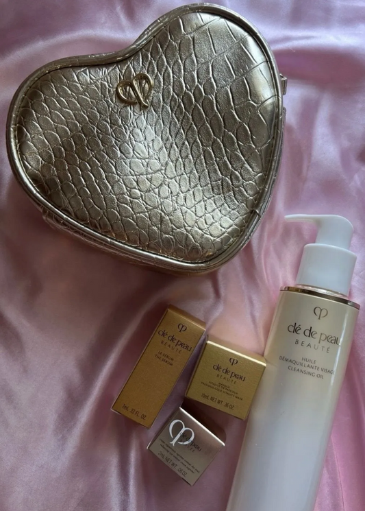 Cle de Peau Beauty products with makeup bag